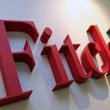 Fitch �������� ������� ������ � BBB �� BBB-