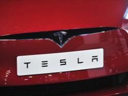  ,     Tesla